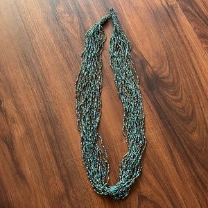 Long beaded costume necklace